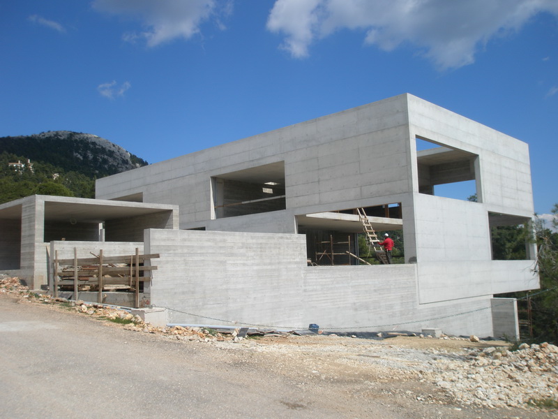 Two Family House, Ippokrateios Politeia, Athens-Suspended slabs using steel profiles, Big walls with openings